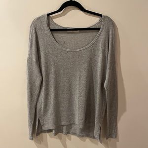 Very light, grey sweater
